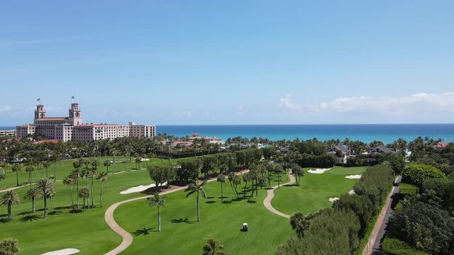 Palm Beach, Florida, panoramic aerial view of the ocean and beautiful well maintained golf course and turquoise blue ocean