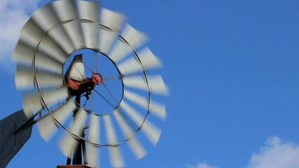 Texas Windmill spinning in wind
