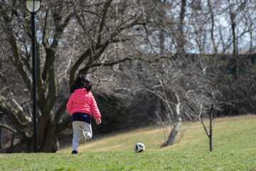 Playing soccer at the park