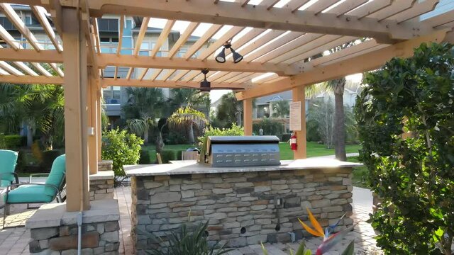 Beautiful masonry work and a trellis arbor for a grilling station