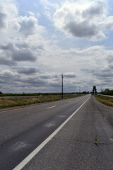Fototapeta na wymiar Vertical shot of an empty road