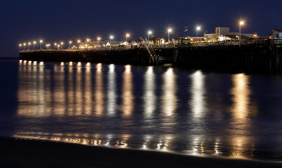 Fototapeta na wymiar Santa Cruz Municipal Wharf during the blue hour. Santa Cruz, California, USA.