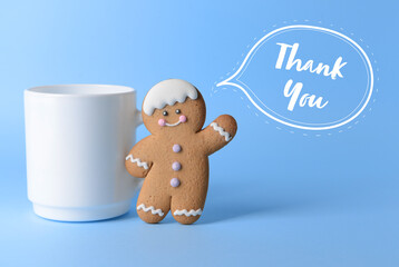 Cup with cookie on color background. Friendship Day celebration