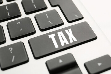 Modern computer keyboard, closeup. Concept of taxes