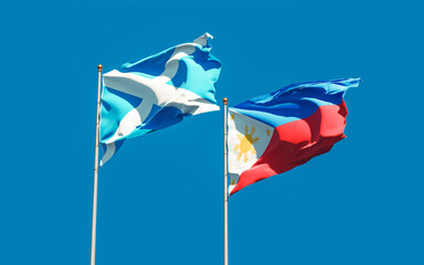 Flags of Scotland and Philippines.