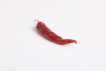 dry red chilly on white background.