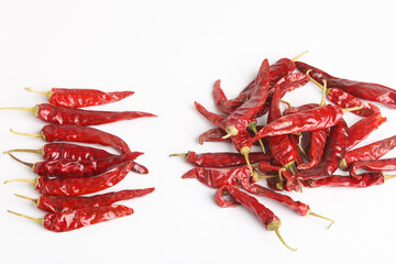 dry red chilly on white background.