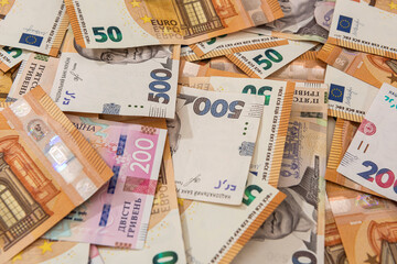 hrivna and euro bills as finance background