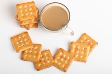 Morning breakfast concept. tea cup and Biscuit on white background.