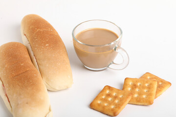 Famous breakfast. Tea and Bun on wooden background