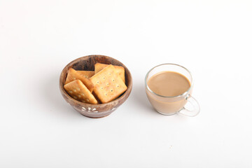 Morning breakfast concept. tea cup and Biscuit on white background.