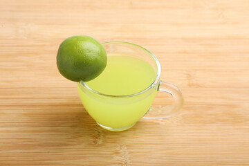 green tea with lemon on white background.