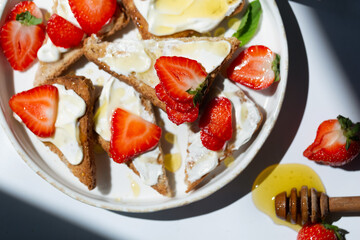 Healthy food breakfast strawberry toast with butter cream
