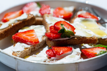 Healthy food breakfast strawberry toast with butter cream