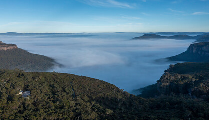 Fototapeta na wymiar Aerial view of fog in Megalong Valley in The Blue Mountains in Australia