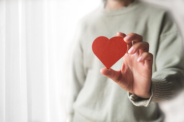Red hearts with loving and caring adults. Symbol of support that expresses love valentine day and...