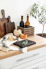Naklejka na ściany i meble Cutting boards with rosemary on kitchen counter