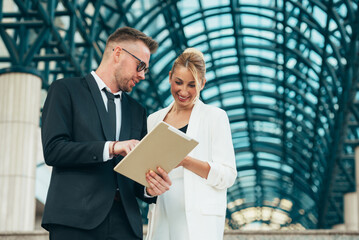 Businesspeople using digital tablet