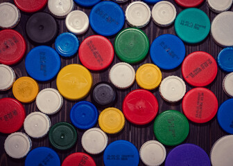 colorful flat layer of plastic caps