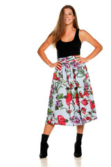 a young beautiful smiling woman in skirt and a shirt