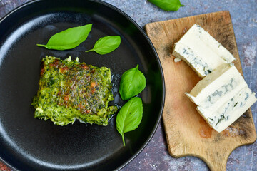 Fish bake refined with  spinach and gorgonzola cheese crust.Ketogenogic diet food