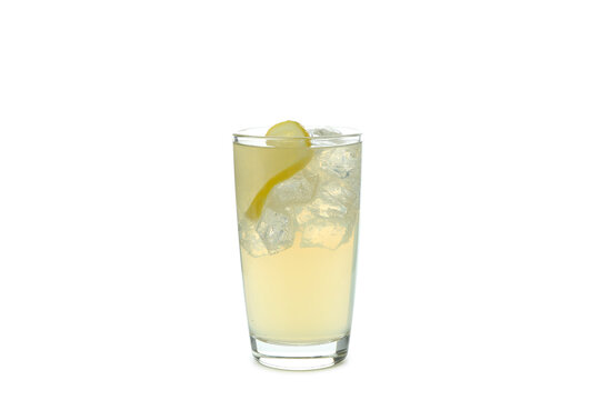 Glass of ginger beer with ice and lemon isolated on white