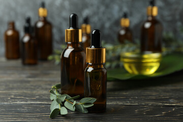 Concept of natural cosmetics with eucalyptus oil on wooden table