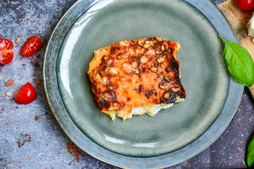  Fish bake preparated in Ticino style  with sweet gorgonzola  cheese and tomato crust