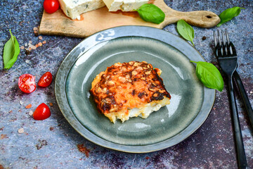  Fish bake preparated in Ticino style  with sweet gorgonzola  cheese and tomato crust