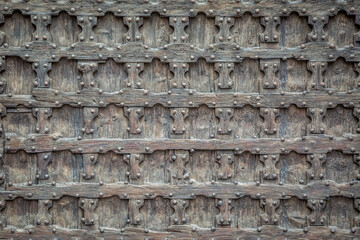 Old wood background. Old wooden door. Church of St. Anastasia in Verona, Veneto, Italy
