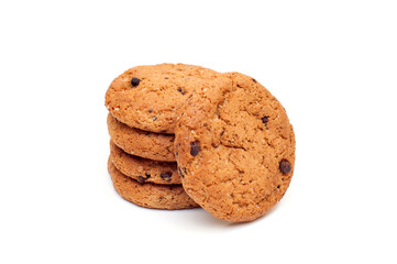 Stack of oatmeal cookies with chocolate pieces isolated on white