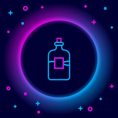 Glowing neon line Glass bottle of vodka icon isolated on black background. Colorful outline concept. Vector