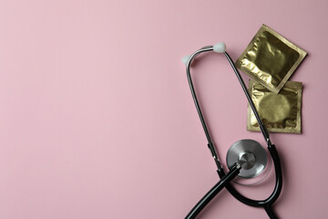 Sex concept on pink background, space for text