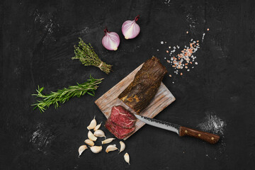Beef jerky on cutting board