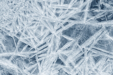 Ice background texture. Frozen water in various geometric abstract shapes. Seasonal natural effect....