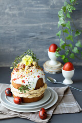Easter cake kulich. Traditional Easter sweet bread decorated meringue.