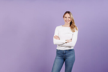 Friendly relaxed casual young woman in denim jeans