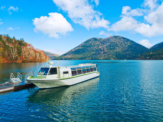 Sightseeing boat at Shikaribetsu lake in Hokkaido, Japan.