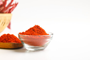 Dried red chilli wooden bowl on white background.