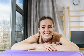 Portrait of smiling girl at spa massage