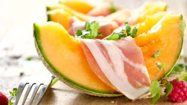 melon slice with prosciutto ham