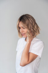 Portrait of a girl of European appearance on a light background