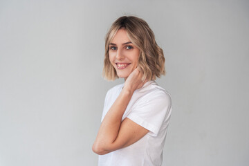 Portrait of a girl of European appearance on a light background