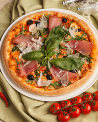 Meat Italian pizza.Pizza round with filling. Restaurant menu