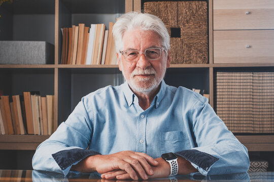 Portrait Of One Old Cheerful Male Senior Smiling Having Fun At Home. Mature Caucasian Man Studying Independent Looking At The Camera And Posing To Picture.
