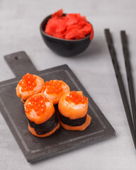 Different rolls and sushi. Asian cuisine.