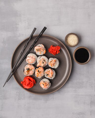 Different rolls and sushi. Asian cuisine.