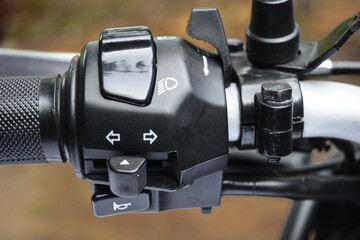Close up of motorcycle handle bar switches