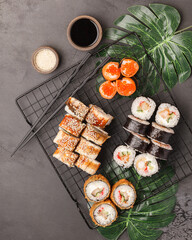 Different rolls and sushi. Asian cuisine.