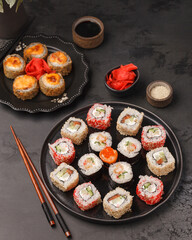 Different rolls and sushi. Asian cuisine.